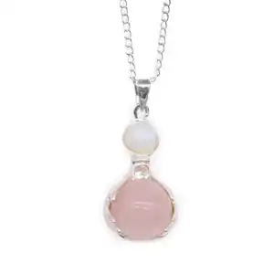 Gemstone Healing Hands Pendant – Rose Quartz | www.artisangoods.co.uk 1